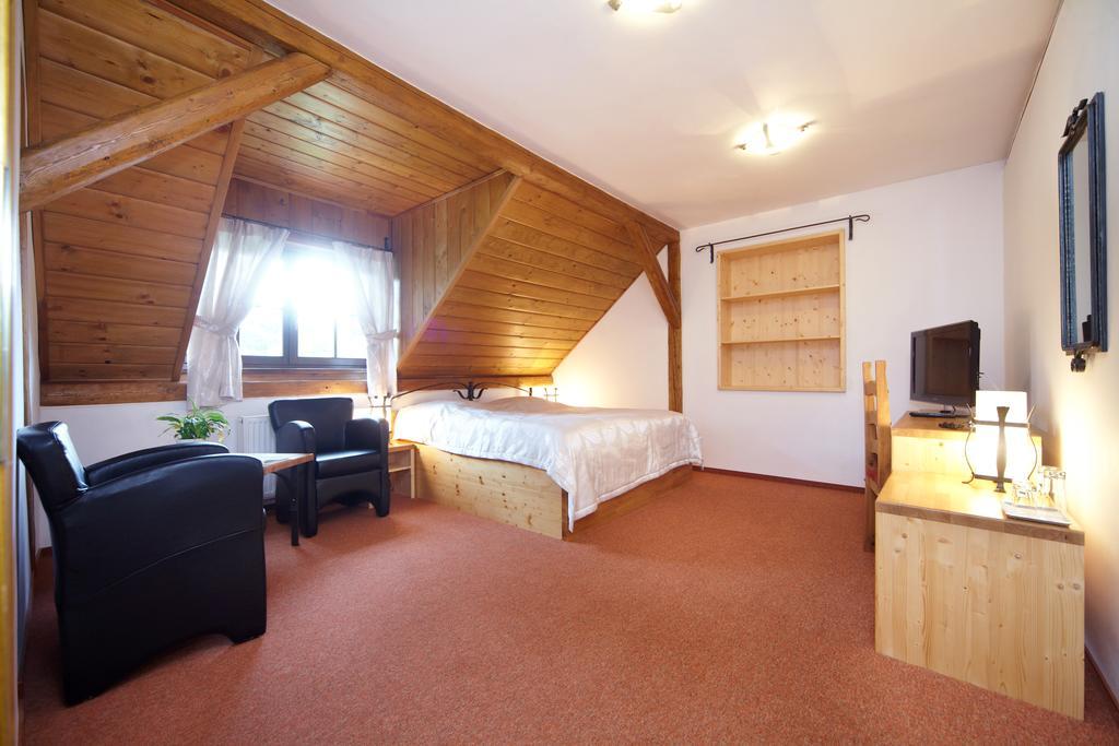 Hotel Holzberg Suchá Rudná Zimmer foto